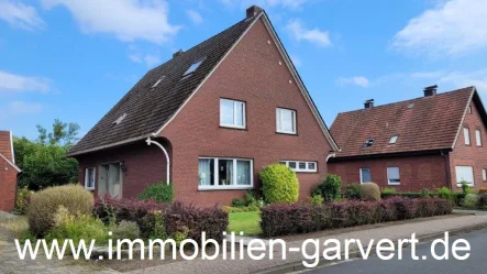 Ansicht - Haus kaufen in Velen - Familienoase! Einfamilienhaus für 2 Generationen, großer Garten, Doppelgarage, ruhige Wohnlage in Velen 