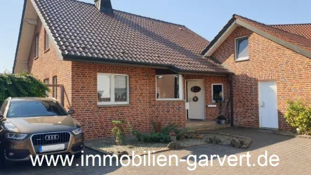 Ansicht - Haus kaufen in Borken - Familienoase! Attraktives Einfamilienhaus, Garten, Carport, Keller, ruhige Sackgassenlage in Borken