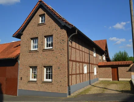 Außenansicht - Wohnung mieten in Bornheim-Waldorf - Alter Hof - moderne Maisonettewohnung mit separatem Zugang!