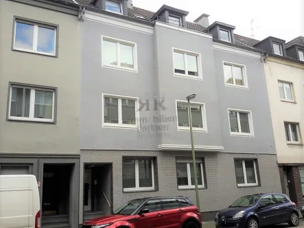 Hausansicht - Haus kaufen in Duisburg - Voll vermietetes, gepflegtes Wohn- und Geschäftshaus.