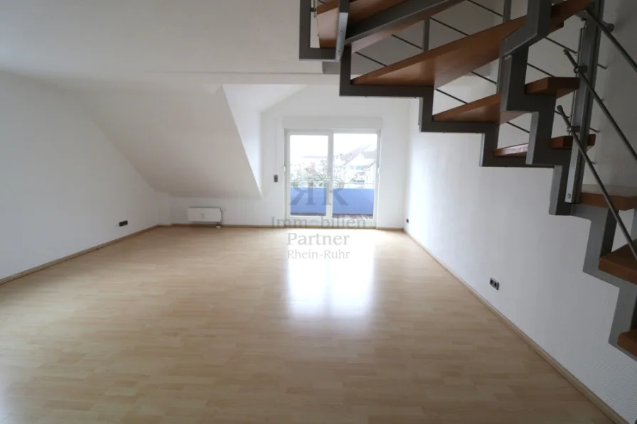 Wohnzimmer - Wohnung kaufen in Dinslaken / Hiesfeld - Schöne Maisonette-Eigentumswohnung in bevorzugter Lage von Hiesfeld!