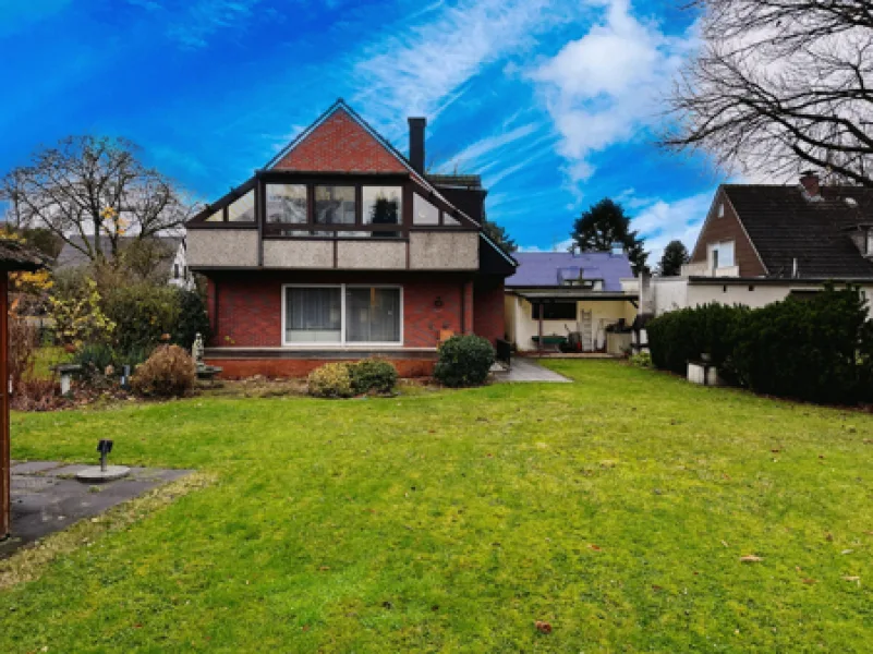 Objektrückansicht - Haus kaufen in Dortmund - Ein-/ Zweifamilienhaus mit Baugrundstück in gefragter Lage von Dortmund zu verkaufen