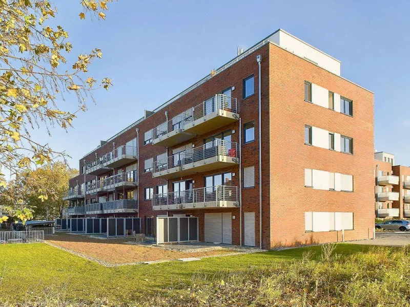 rükwertige Ansicht Haus 5 - Wohnung mieten in Düren - Neuwertige und modern ausgestattete Etagenwohnung mit Sonnenbalkon.