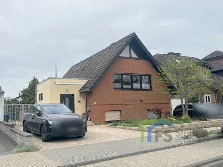 Front - Haus kaufen in Niederzier - Splitlevel in Krauthausen