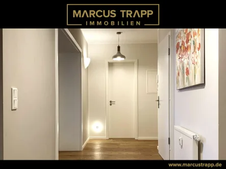 _Startbild_Logo_Marcus Trapp Immobilien_schwarz._0012 - Wohnung kaufen in Düsseldorf - Hochwertig sanierte 3-Zimmer-Wohnung in Düsseltal – Einziehen und Wohlfühlen!