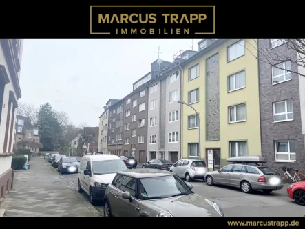 Startbild_Logo_Marcus Trapp Immobilien_schwarz.001 - Wohnung kaufen in Düsseldorf - Geräumige 2-Zimmerwohnung zuverlässig vermietet in guter Lage von Düsseldorf-Rath
