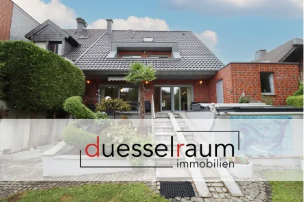 Titelbild - Haus kaufen in Mönchengladbach / Venn - Venn: DHH ohne Gassorgen dank Wärmepumpe mit Erdwärme , A+ , Garage und Garten in ruhiger Lage