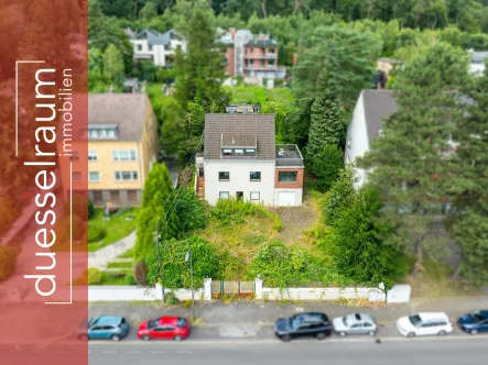 Titelbild - Grundstück kaufen in Düsseldorf - Unterbach: 840 m² Baugrundstück mit Baurecht & vorhandener Projektierung für ein 6-Familienhaus