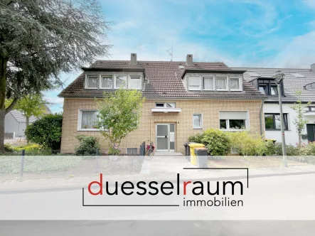 Titelbild - Haus kaufen in Düsseldorf / Unterrath - Unterrath: gepflegtes Mehrfamilienhaus mit 2 Balkonen und Garten in ruhiger Lage