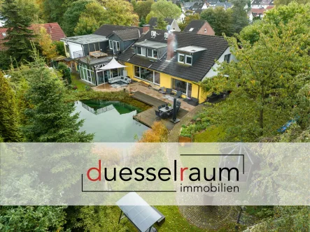 Titelbild - Haus kaufen in Solingen / Ohligs - Idyllisches Wohnen in Solingen: Stilvolles Haus mit Schwimmteich und separater Einliegerwohnung!