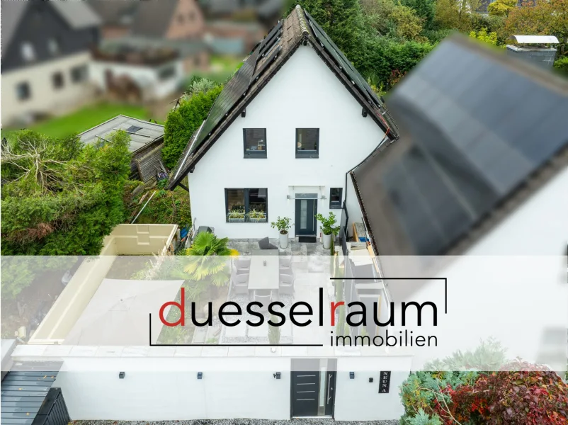 Titelbild - Haus kaufen in Meerbusch / Lank-Latum - Meerbusch: moderne und energieeffiziente DHH mit Stellplatz, Garten und Terrasse in ruhiger Lage!