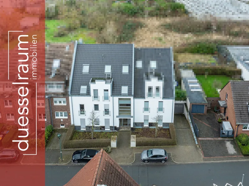 Titelbild - Wohnung kaufen in Düsseldorf - Hamm: Neuwertige und moderne Maisonette-Wohnung in ruhiger Lage nur wenige Meter vom Rhein entfernt!