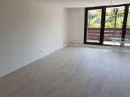  Wohnzimmer zum Balkon