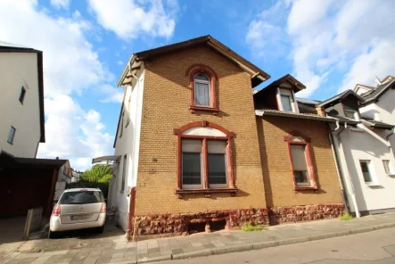 Außenansicht - Haus kaufen in Ludwigshafen - Gemütliches Einfamilienhaus mit schönem Garten in Lu-Mundenheim - WS 4168