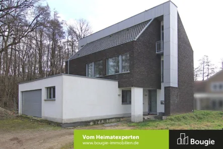 Straßenansicht - Haus kaufen in Selfkant - Energiesparendes Einfamilienhaus mit modernem Grundriss und Ausbaupotenzial!