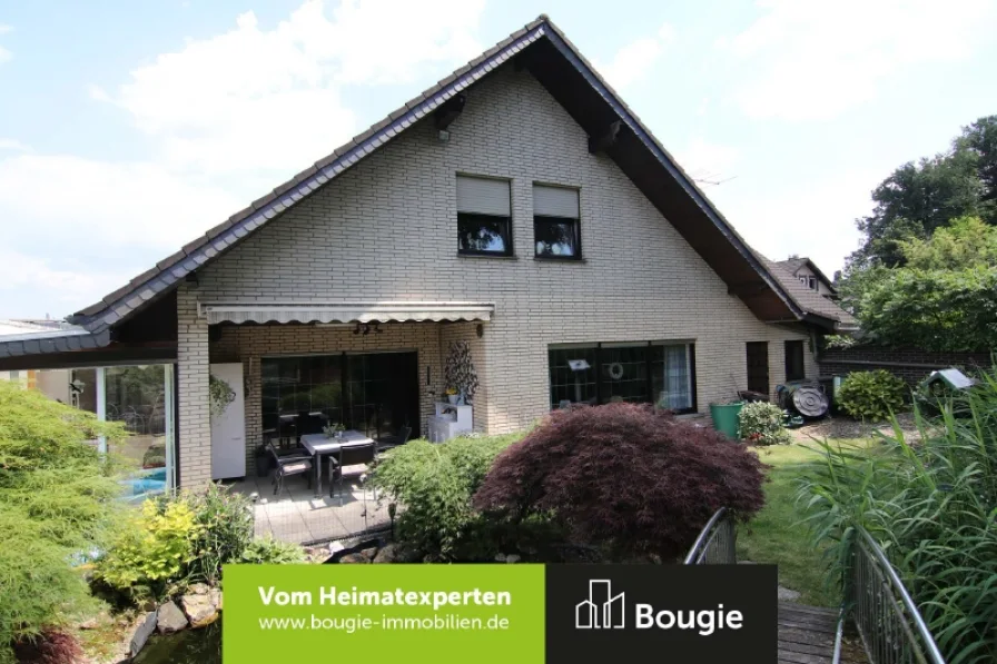 Gartenansicht - Haus kaufen in Heinsberg-Dremmen - Gepflegtes und wohnliches Einfamilienhaus mit vielen Möglichkeiten in ruhiger Lage!