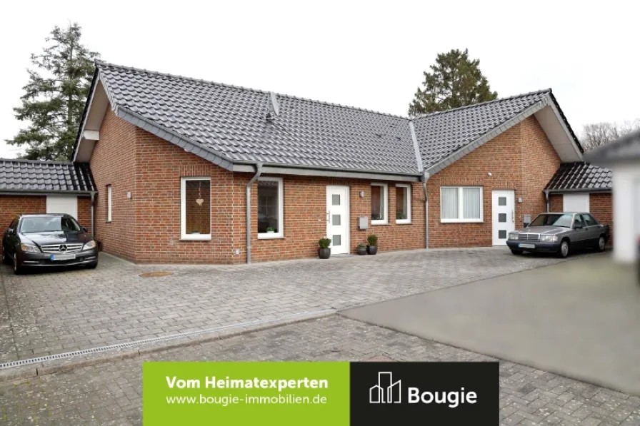 Straßenansicht - Haus kaufen in Wassenberg - TOP-gepflegtes und gut vermietetes Anlageobjekt in ruhiger Lage