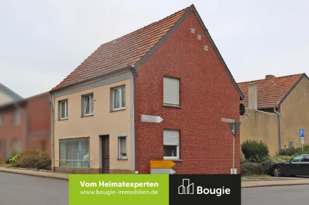 Straßenansicht - Haus kaufen in Gangelt - Günstige Immobilie in zentraler Ortslage von Birgden