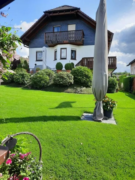 1707224882-2.jpeg - Haus kaufen in Reichshof - Charmantes top gepflegtes Einfamilienhaus in Reichshof-Berghausen!