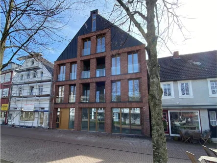 Titelbild - Wohnung kaufen in Gütersloh - Neubaueigentumswohnung am Dreiecksplatz