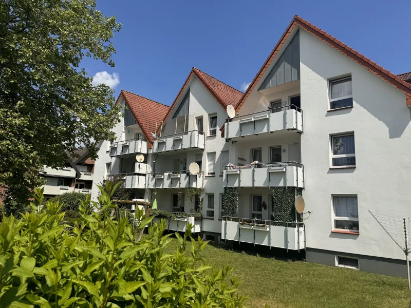 Außenansicht  - Wohnung kaufen in Rheda-Wiedenbrück - Dachgeschosswohnung mit Westbalkon in ruhiger Wohnlage von Rheda