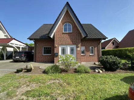 Titelbild - Haus kaufen in Versmold - Neuwertiges Einfamilienhaus in toller Wohnlage von Versmold-Peckeloh