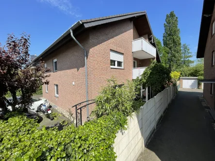 Titelbild - Wohnung kaufen in Gütersloh - Attraktive Dachgeschosswohnung in Gütersloh - Avenwedde