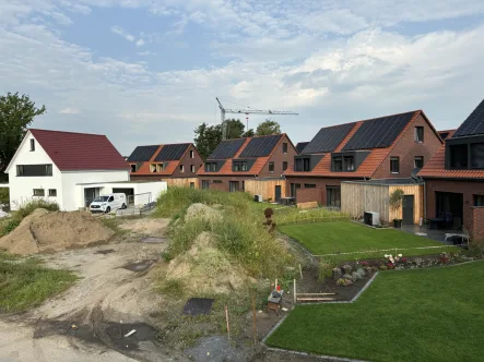 Titelbild - Grundstück kaufen in Gütersloh - Einfamilienhaus in Isselhorst - Wohnen an der Krullsbachaue