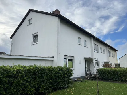 Außenansicht Hauseingang - Haus kaufen in Bielefeld - Helles Reihenendhaus, großer Garten und Garage im schönen Bielefeld Babenhausen