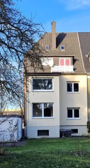 Gartenansicht - Haus kaufen in Hagen - Dreifamilienhaus (DHH) aufgeteilt in 3 ETW - mit großem Gartengrundstück!