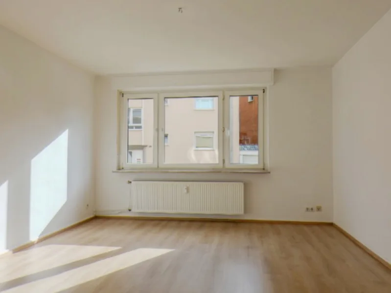 Wohnzimmer - Wohnung mieten in Hagen - Helle 3-Zimmer-Erdgeschosswohnung mit Balkon in gepflegtem Mehrfamilienhaus