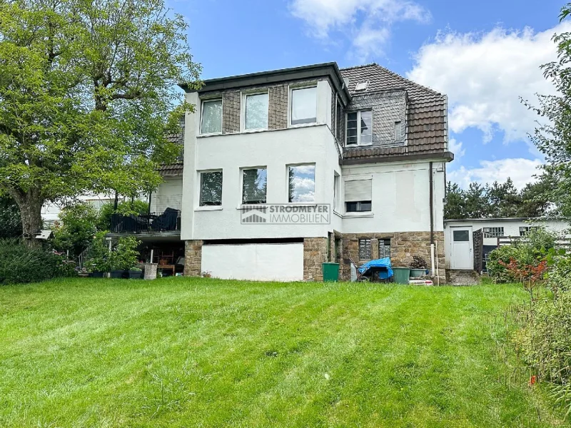 Gartenansicht hinten - Haus kaufen in Hagen - Hagen-Fleyerviertel - Stilvolles Zweifamilienhaus auf einem großen Grundstück