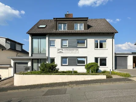 Ansicht - Haus kaufen in Hagen - 3-Familienhaus in Hagen-Kuhlerkamp  aufgeteilt in 3 ETW