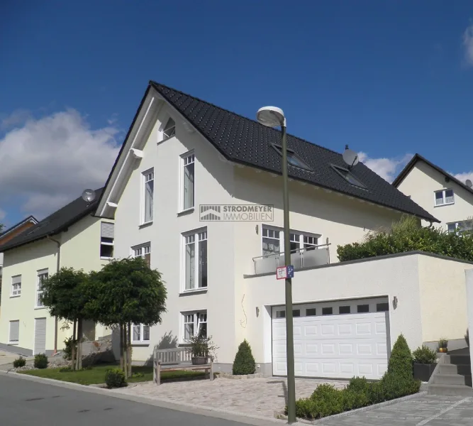 Hausansicht - Haus kaufen in Hagen - Familienfreundliches Einfamilienhaus aus dem Jahr 2005 mit traumhafter Terrasse und Doppelgarage!