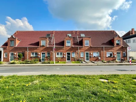 Straßenansicht - Zinshaus/Renditeobjekt kaufen in Nottuln - 5 vermietete Reihenhäuser vor den Toren Münsters 