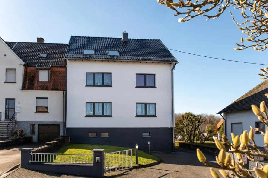 Vorderansicht - Haus kaufen in Heusweiler - Richtig investieren in Qualität und Lage.