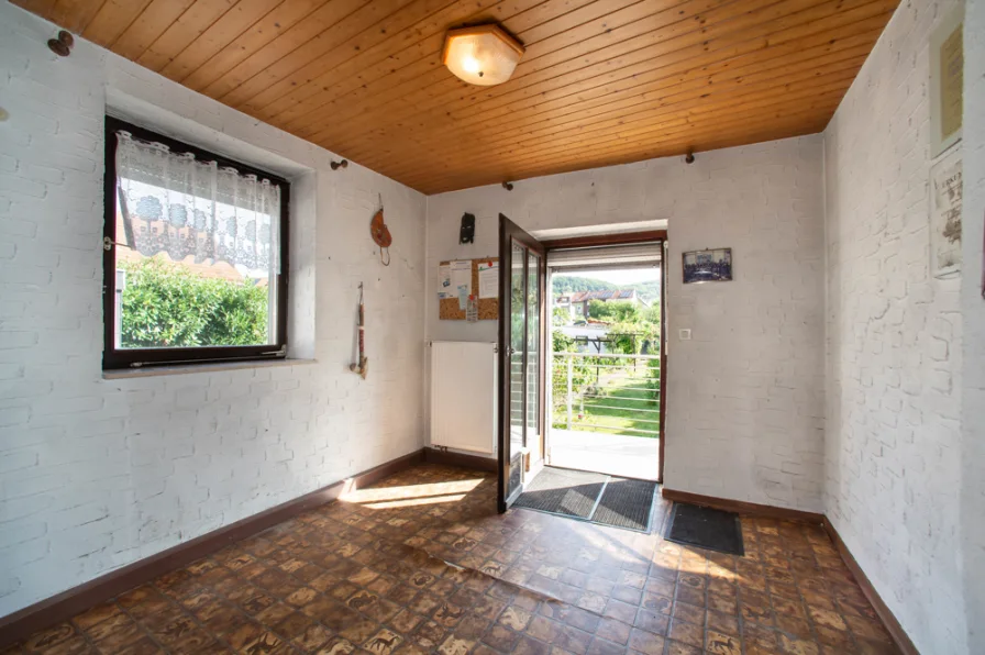 Büro mit Balkon und Treppe zum Garten 