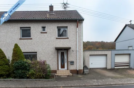 Ihr neues Zuhause   - Haus kaufen in Quierschied - Familienfreundliche Doppelhaushälfte mit Garten