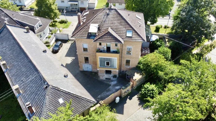 Aussenansicht Bild 2 - Wohnung kaufen in Sprendlingen - Großzügige EG Altbauwohnung mit kleinem Garten und optionaler Lagerhalle zum Kauf in Sprendlingen