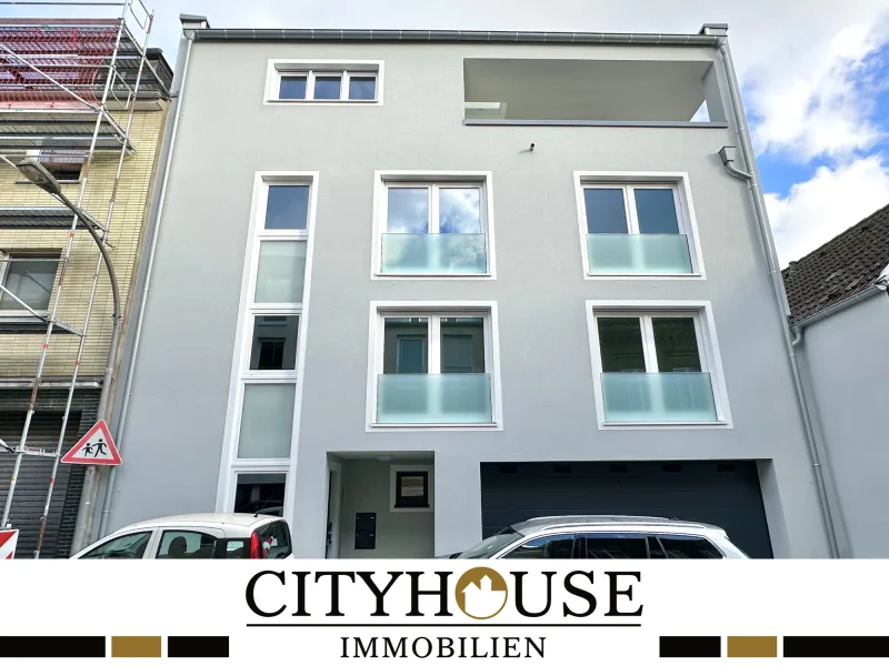 Hausansicht - Wohnung mieten in Köln / Poll - CITYHOUSE: Neubau Erstbezug! Maisonette Wohnung mit Terrasse + Balkon und Garagenstellplatz!