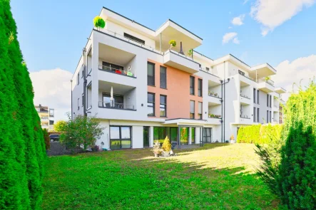 Hausansicht Garten  - Wohnung mieten in Lahnstein - Moderne 3-ZKB Wohnung mit Einbauküche, TG und PKW Stellplatz, Terrasse und Garten in Oberlahnstein