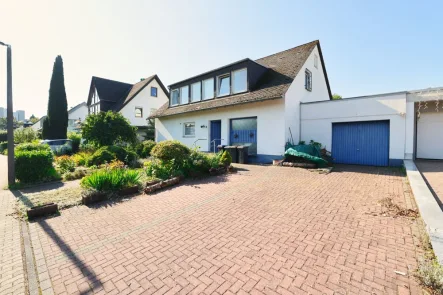 Hausansicht  - Haus kaufen in Vallendar - Freistehendes Einfamilienhaus mit großzügigem Garten in Vallendar- Mallendarer Berg