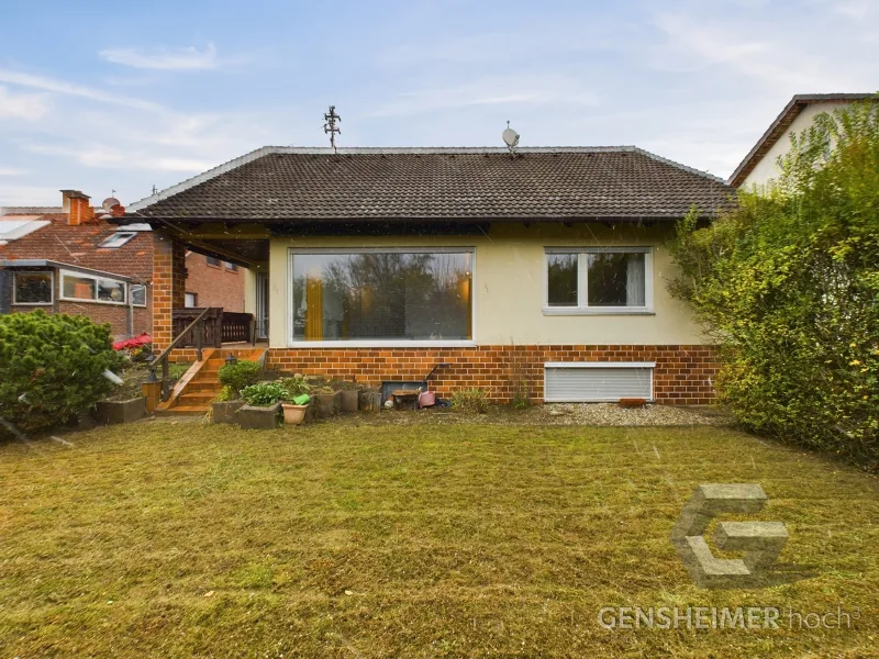 Gartenansicht - Haus kaufen in Kapellen-Drusweiler - Charmantes Einfamilienhaus im Bungalowstil: Gestalten Sie Ihr Traumzuhause!