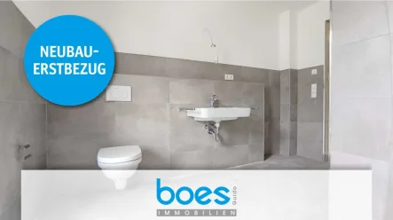 Badezimmer mit Logo - Wohnung mieten in Langenfeld - ERSTBEZUG !!! Exklusive Neubauwohnung freut sich auf Mieter