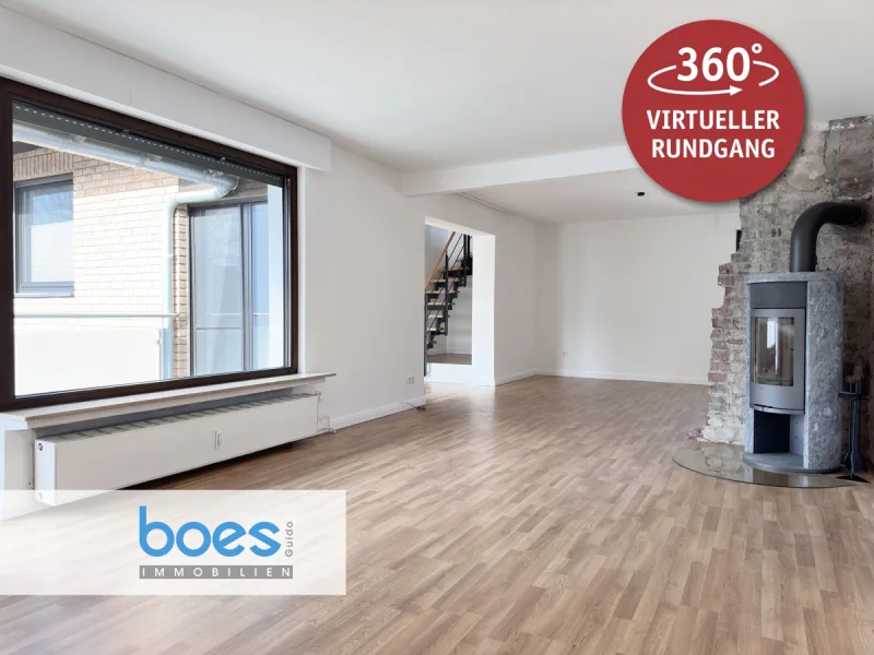 Wohnzimmer mit Logo 2 - Wohnung mieten in Langenfeld - Modern wohnen auf zwei Ebenen – Maisonette mit Dachterrasse und Kamin!!!