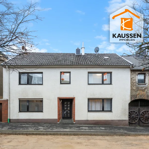 Hausansicht - Haus kaufen in Langerwehe / Hamich - Handwerker-Einfamilienhaus für die Großfamilie mit Garten und Garage in Langerwehe - Hamich