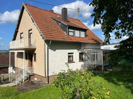 Rückansicht - Haus kaufen in Lebach - Eidenborn - EIDENBORN : 1 - 2 Familienhaus mit 1270 m² GRUNDSTÜCK ( incl. Bauplatz ) in absolut RUHIGER Lage !