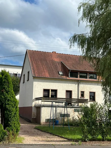 Front - Haus kaufen in Eppelborn - EPPELBORN : 1 -2 FH für HANDWERKER mit guter RAUMAUFTEILUNG !