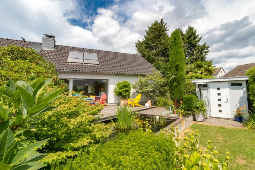 Südansicht - Haus kaufen in Langenfeld (Rheinland) - Sehr gepflegtes, freistehendes Einfamilienhaus in Sackgassenlage von Langenfeld - Wiescheid