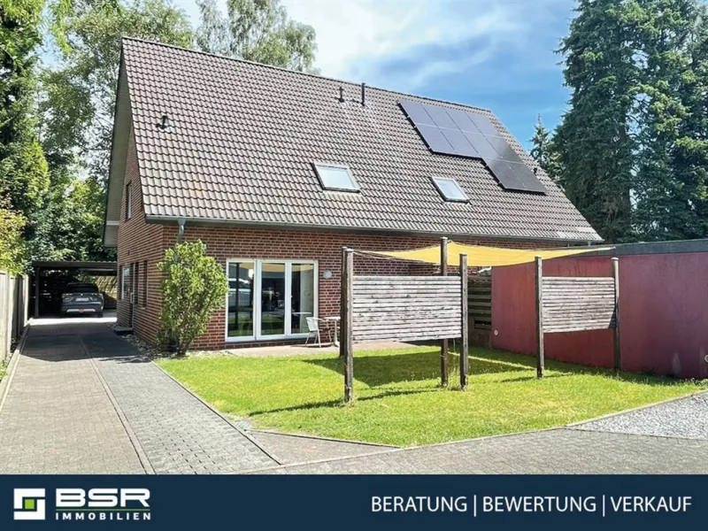 Hausansicht - Haus kaufen in Rheda-Wiedenbrück - Familiengerecht und ein top Energiewert!